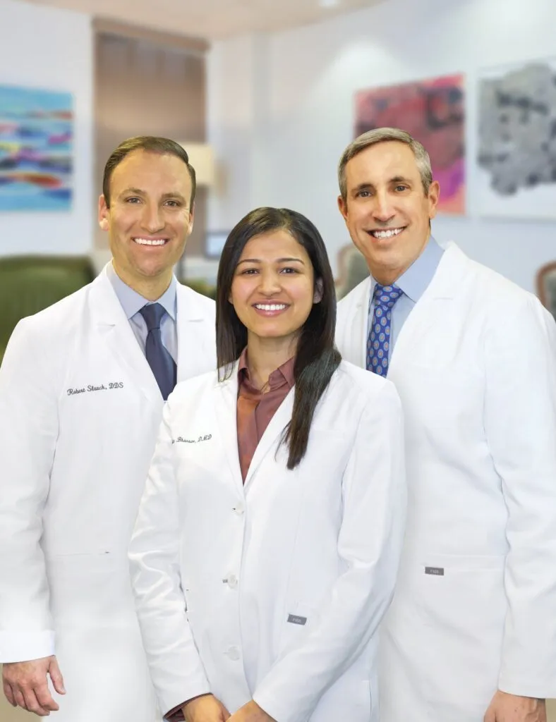 Laudenbach Periodontics & Dental Implants team of three dental professionals in office