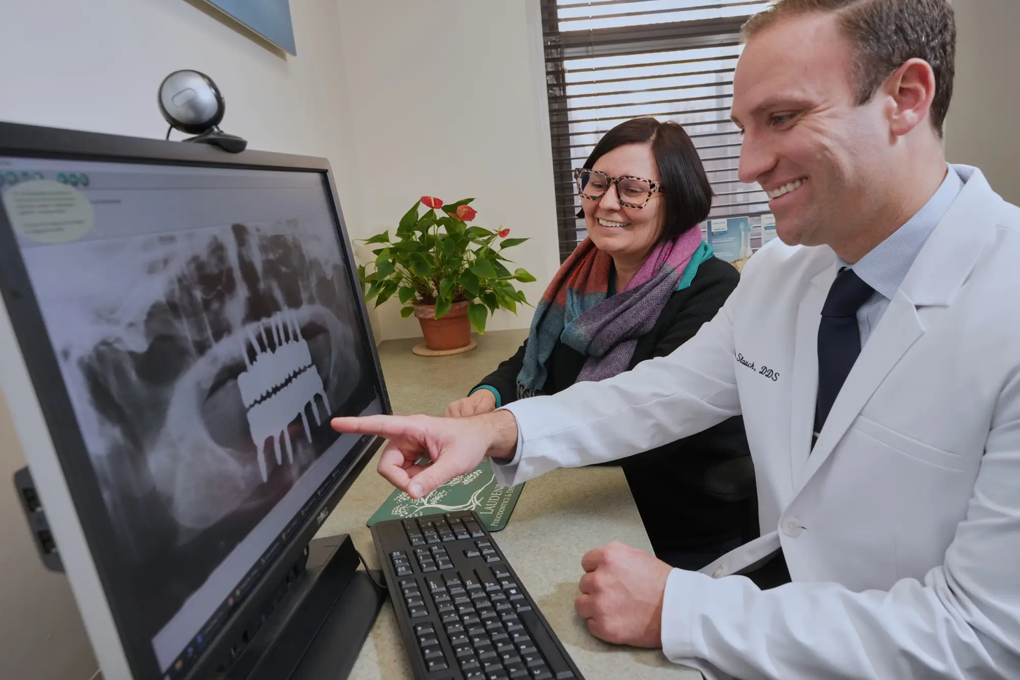 shade matching img - Periodontist Philadelphia | Laudenbach Periodontics & Dental Implants